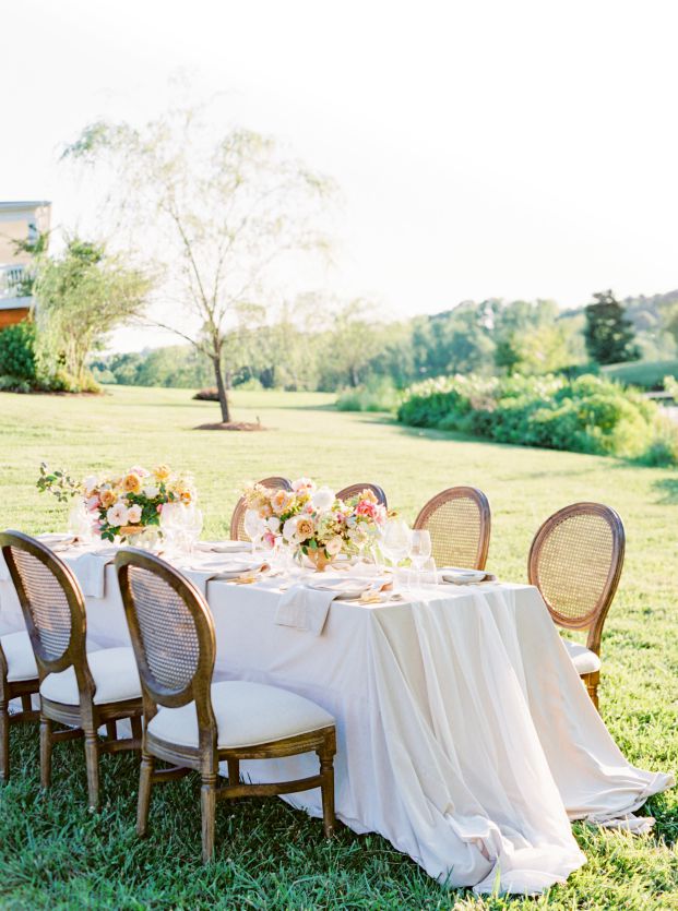 simple wedding dining table in grass field