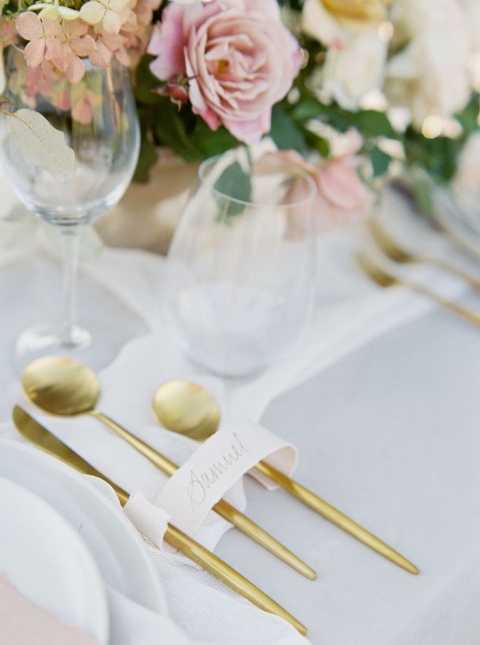 wedding styled shoot dining table flowers and utensil